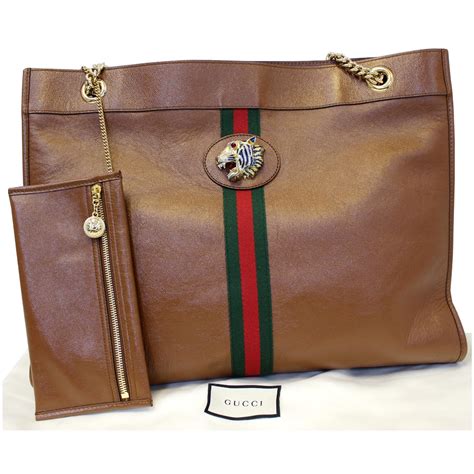 tan gucci hand bag|large leather gucci handbags.